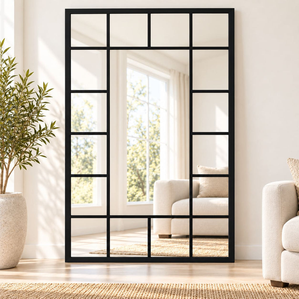 Espejo tipo ventana MAX negro de gran formato apoyado en living moderno y luminoso.