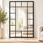 Espejo tipo ventana MAX negro de gran formato apoyado en living moderno y luminoso.